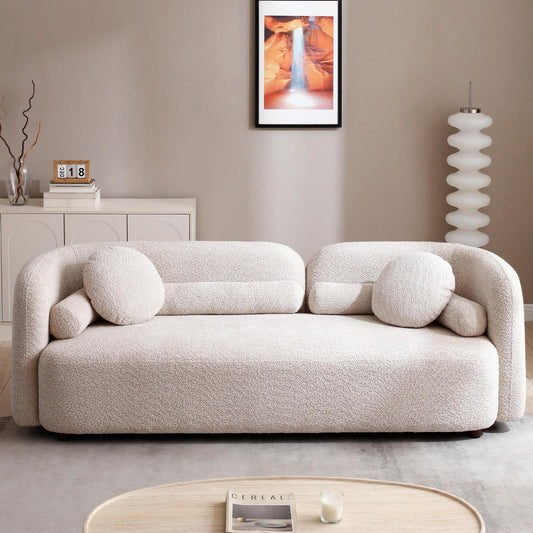 Beige sofa in a modern living room with a neutral color palette.