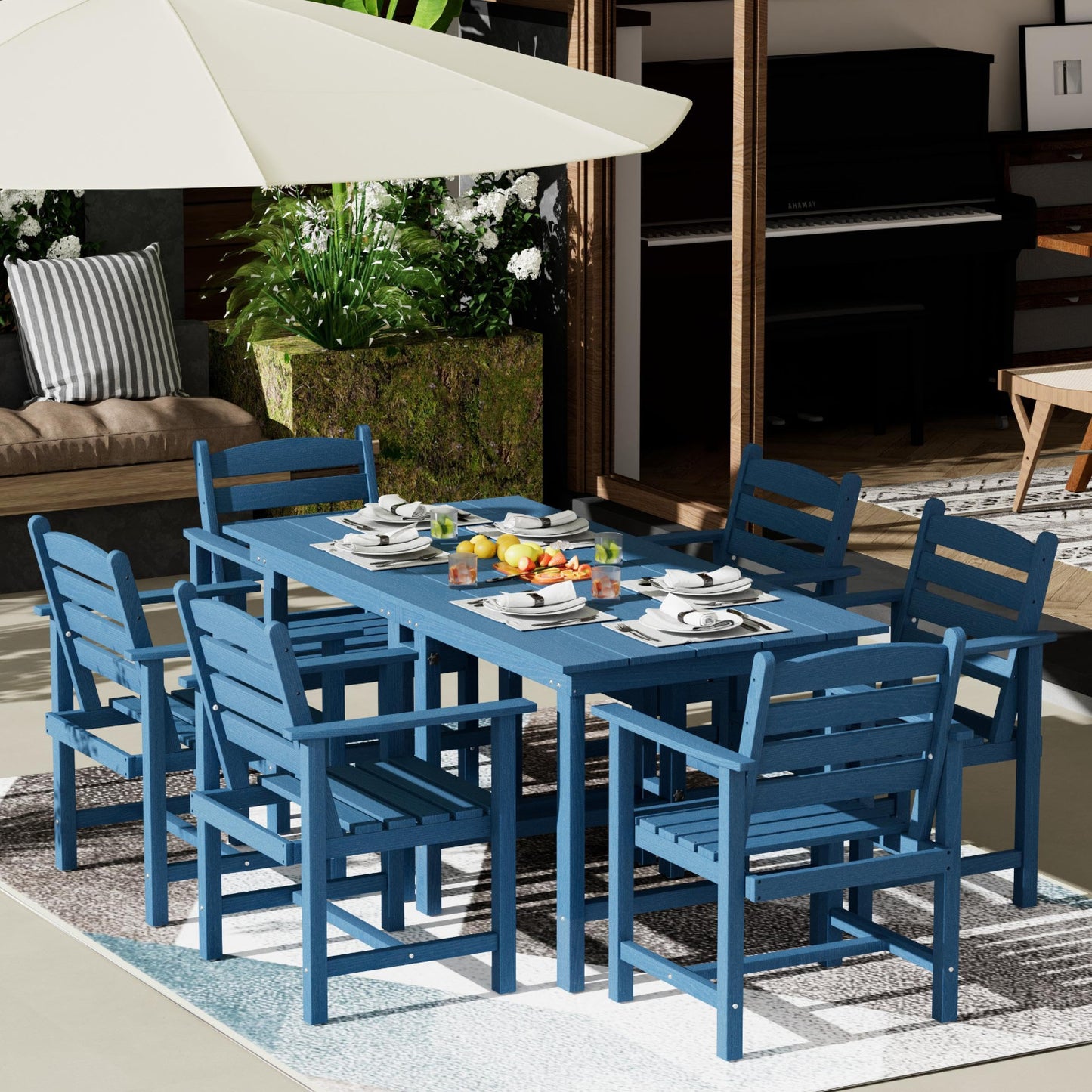 Blue outdoor dining set with table and chairs on a patio