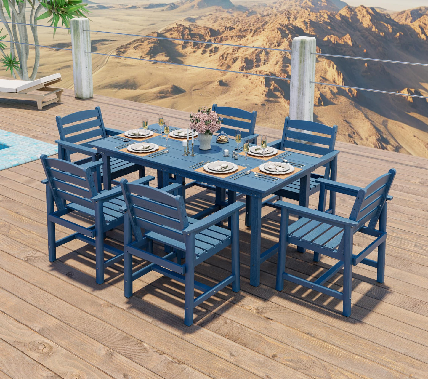 Blue outdoor dining set with chairs on a wooden deck overlooking a mountainous landscape.