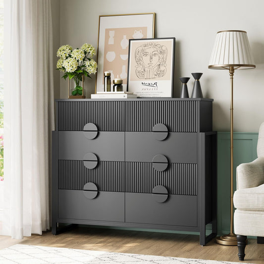 Gray dresser with decorative items in a living room setting