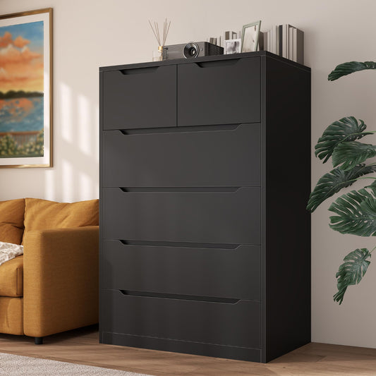 Black dresser with multiple drawers in a living room setting.