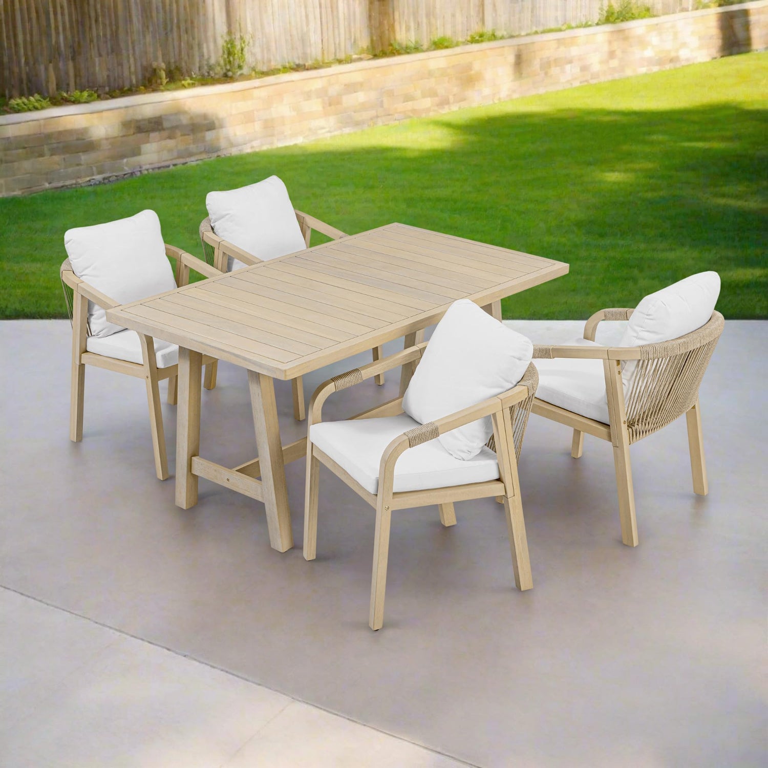 Outdoor dining set with wooden table and chairs on a patio
