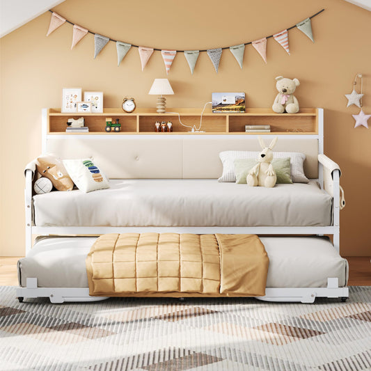 White sofa bed with beige blanket in a room with wooden shelves and decorative items.