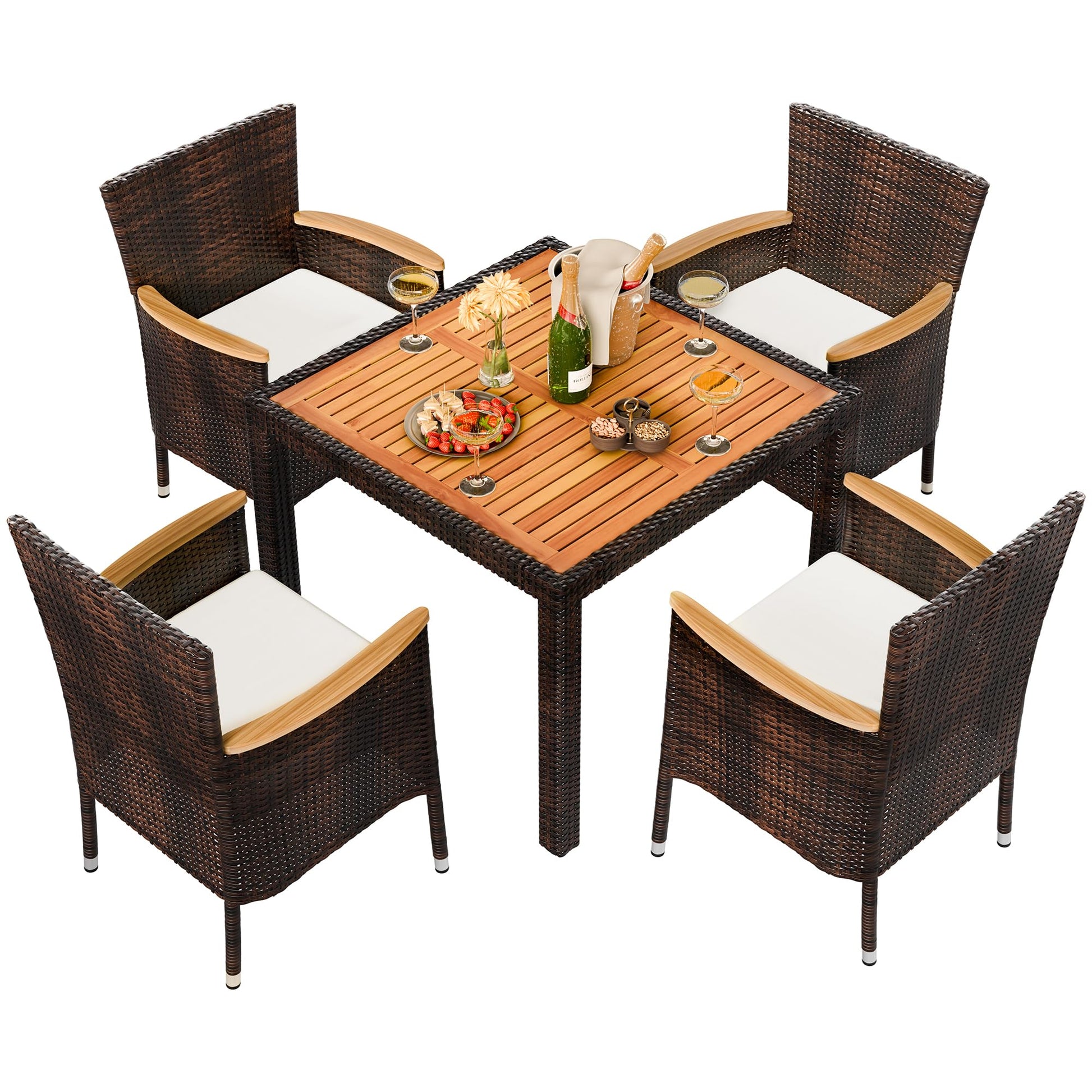 Outdoor dining set with four chairs and a table on a white background