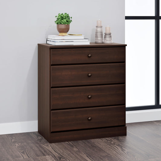 Wooden dresser with three drawers on a wooden floor against a gray wall.