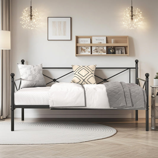 Bedroom with a metal bed frame, pillows, and a shelf on the wall.